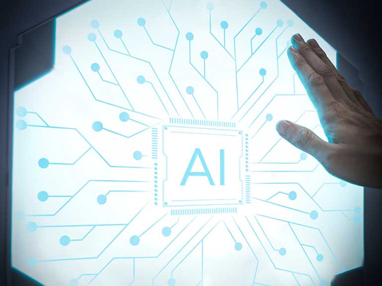 Image of futuristic AI technology microchip with a person’s hand on it
