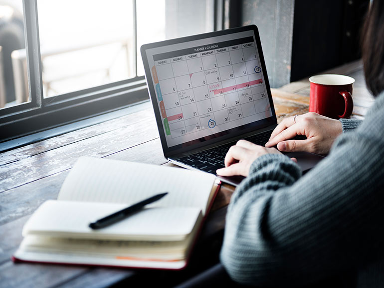 An image of a laptop with charts