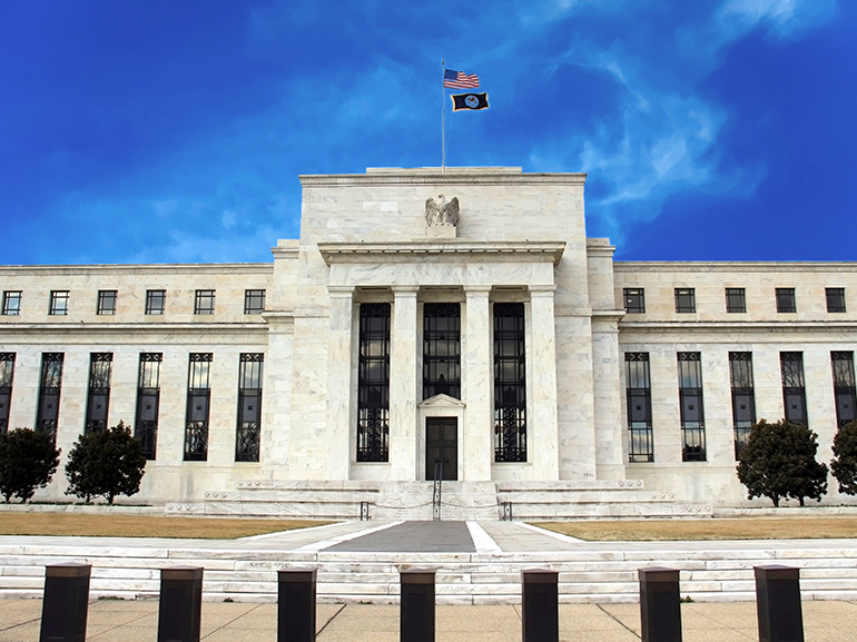 La Fed anuncia una menor subida de tipos de interés, el Dow y los mercados asiáticos suben