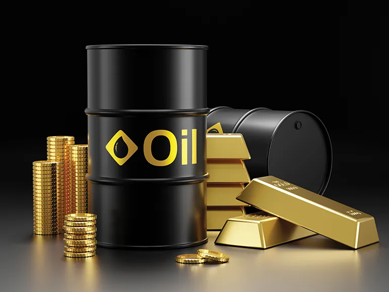 Barriles de petróleo, lingotes de oro y pilas de monedas de oro