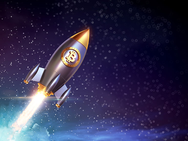 Bitcoin Reaches Record High After Tesla Buy-In