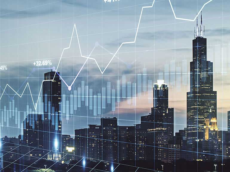 An image of rising charts on a background of a city skyline with skyscrapers