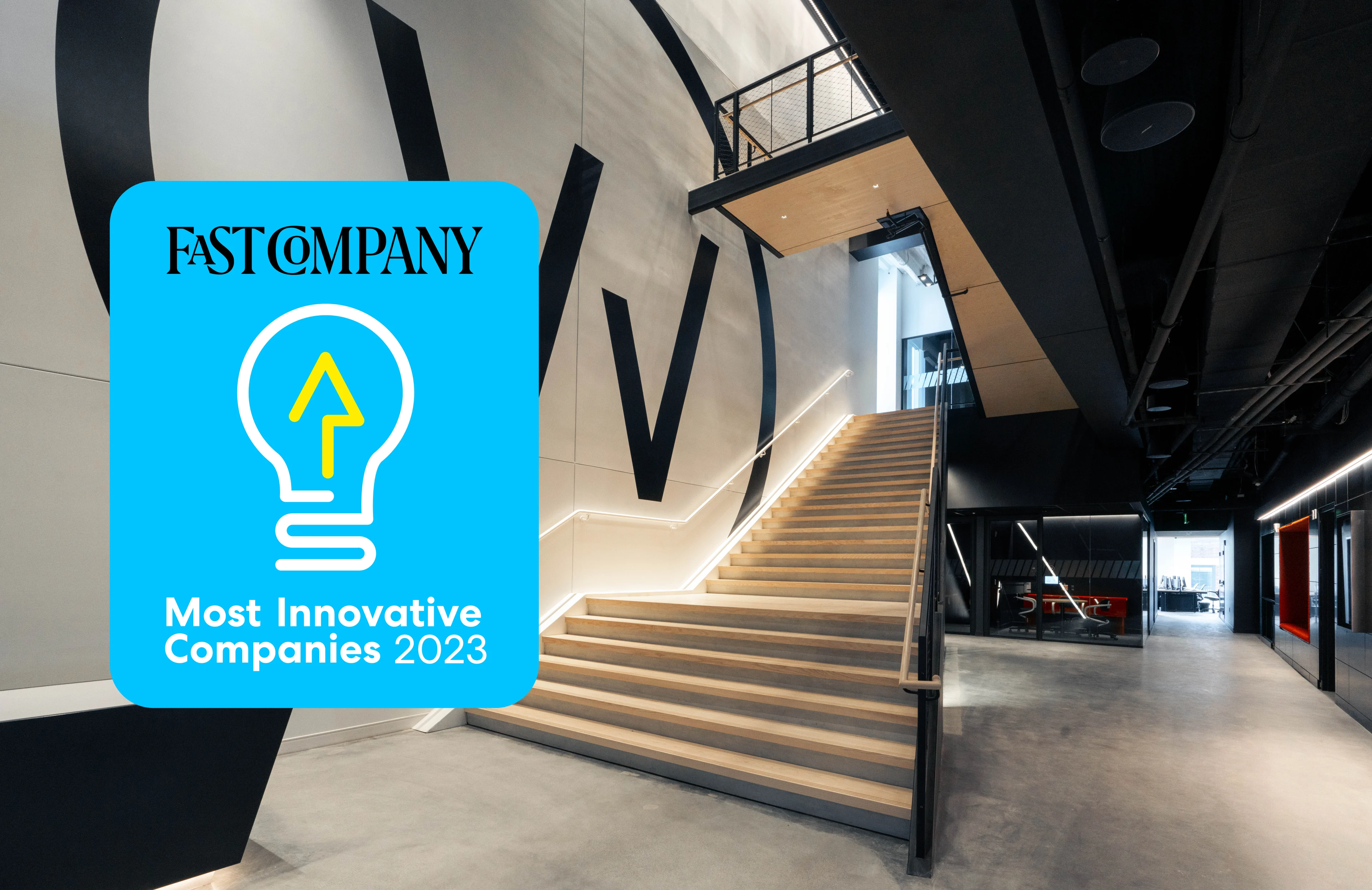 Interior of the contemporary WHOOP office showcasing the 2023 Fast Company Award for Most Innovative Companies.