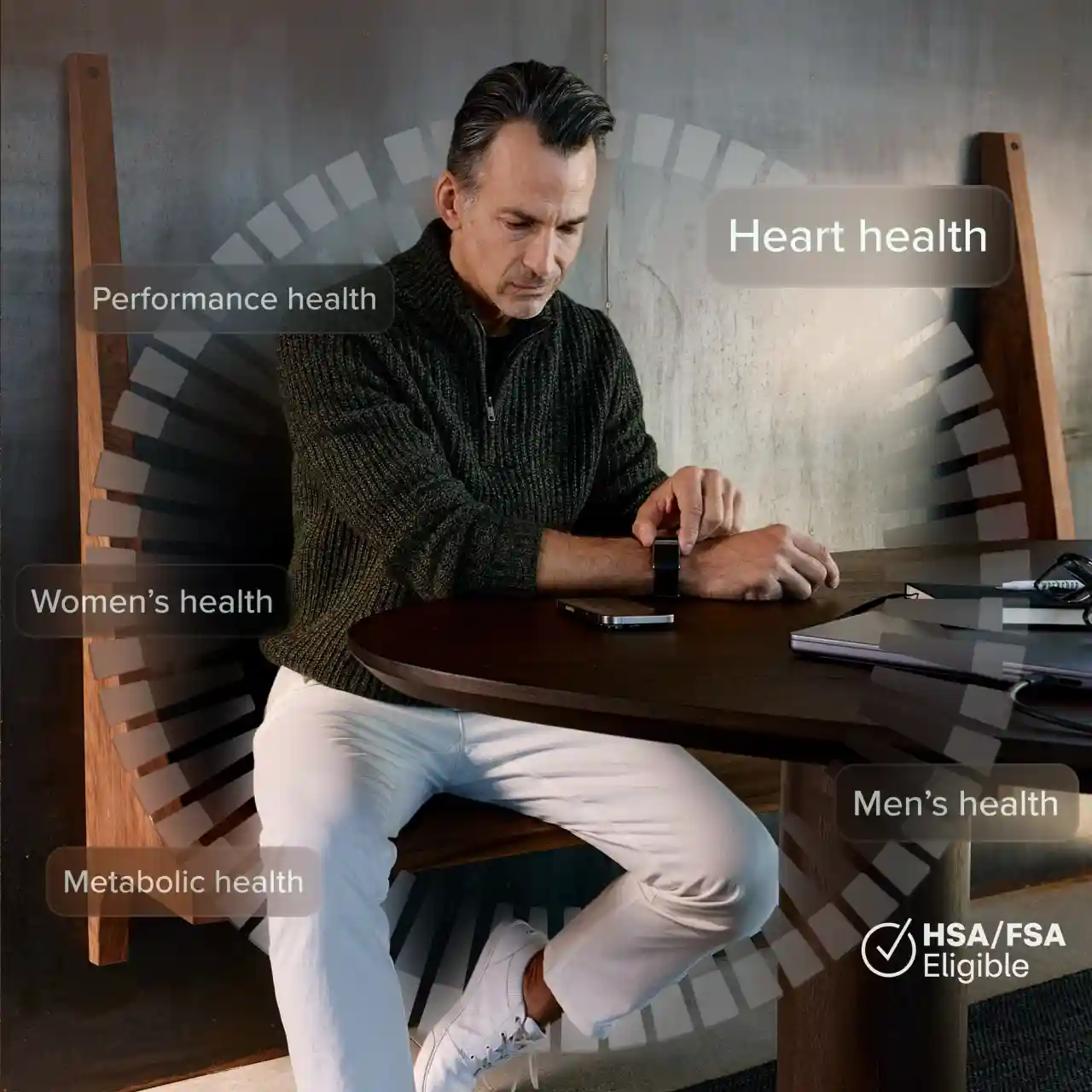 Man reviewing health data on a laptop while wearing a WHOOP wearable, highlighting heart health, metabolic health, and performance monitoring with data-driven insights.
