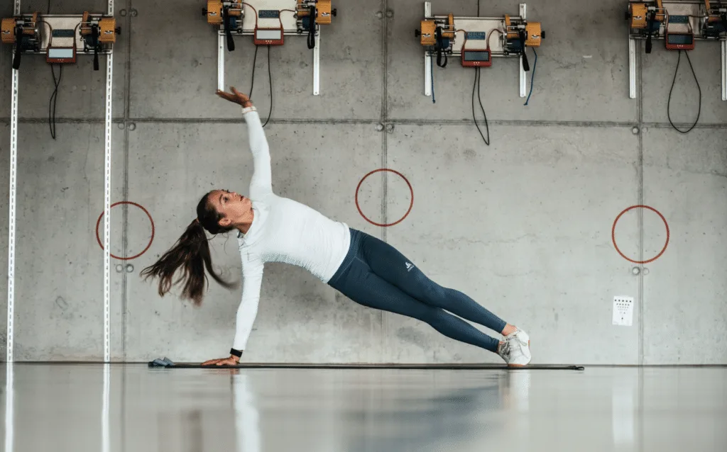 Kate Courtney stretching