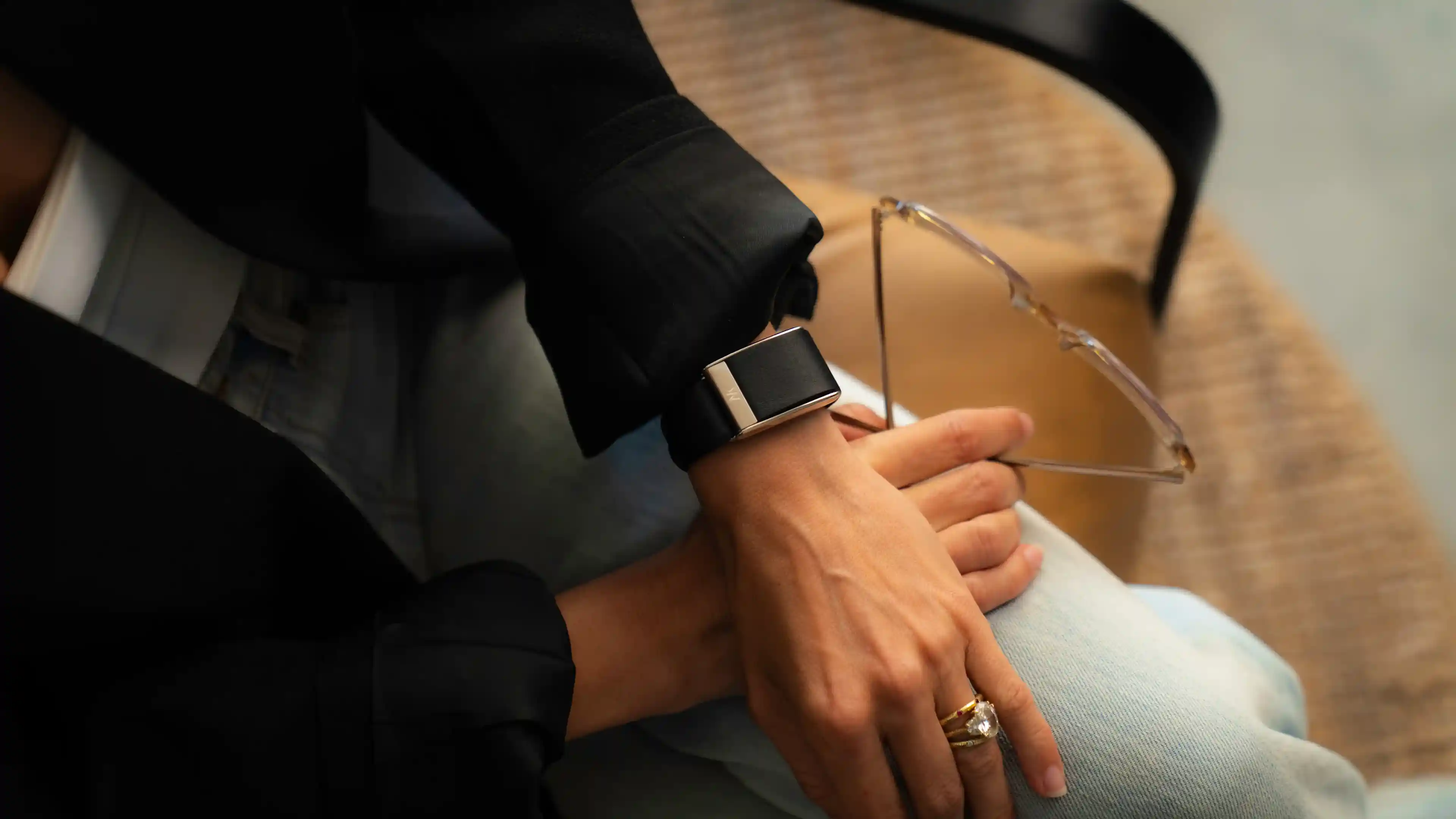 Close-up of a person wearing a WHOOP wearable on their wrist, highlighting continuous health monitoring, recovery tracking, and everyday performance insights.