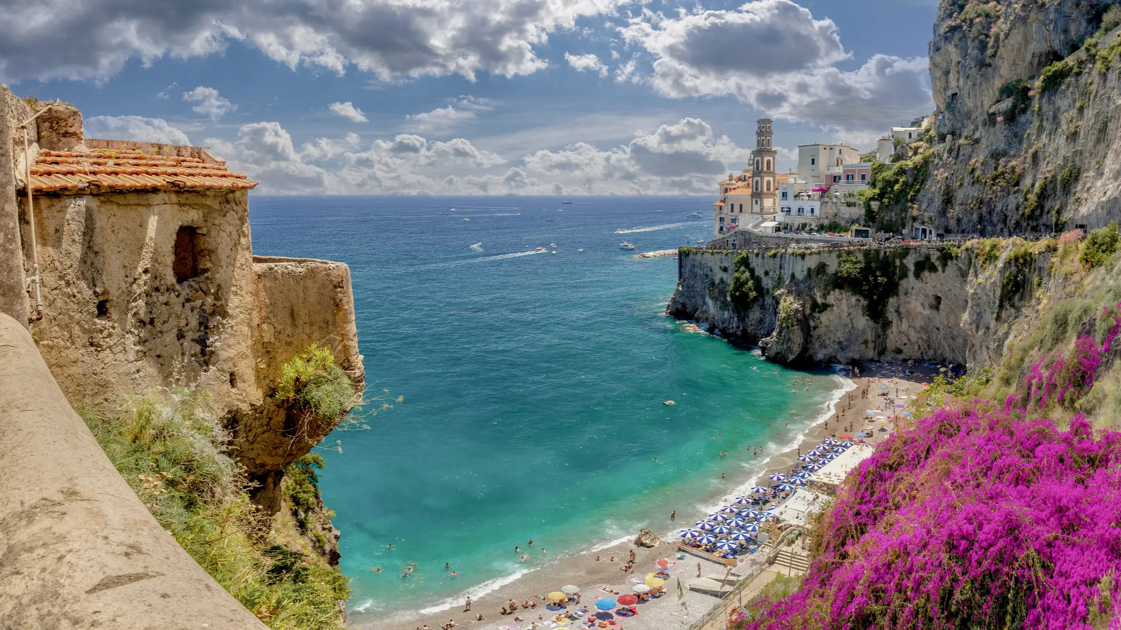 Aerial view of the bay in Castiglione di Ravello with azure blue sea, surrounded by a breathtaking rocky landscape