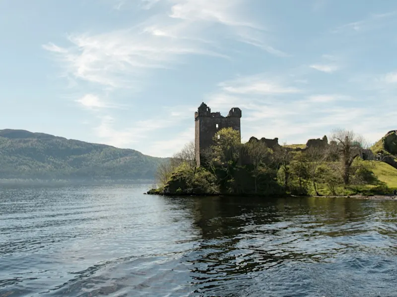 Hiker with a view of Loch Lomond. Trossachs, Stirling, Scotland.