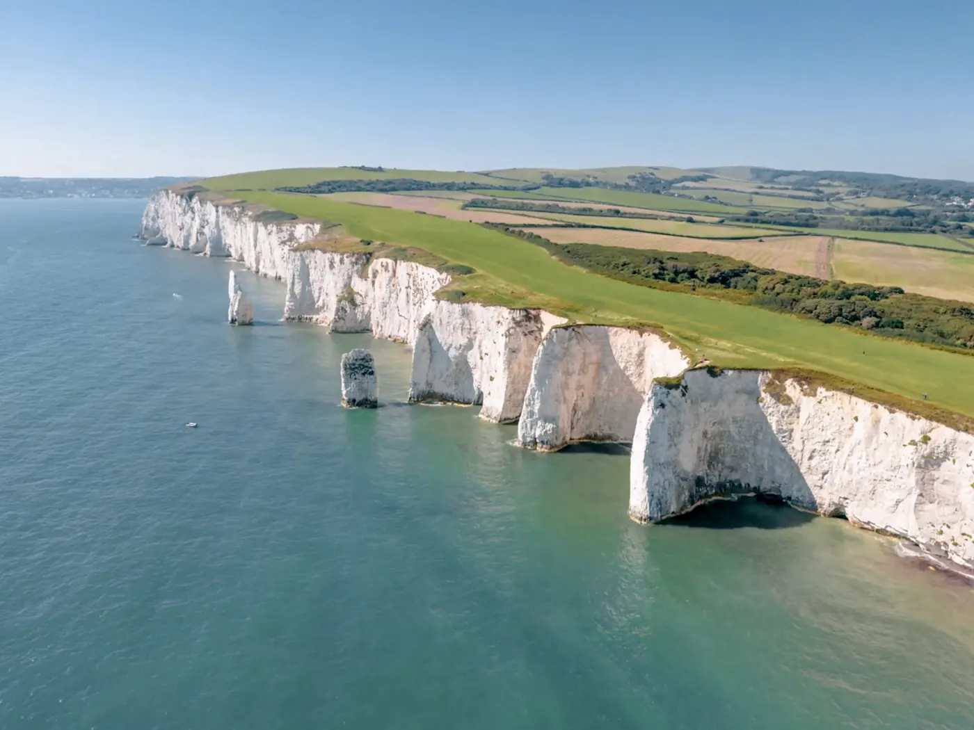 Breathtaking white cliffs and vast countryside in Bournemouth, Dorset, England.