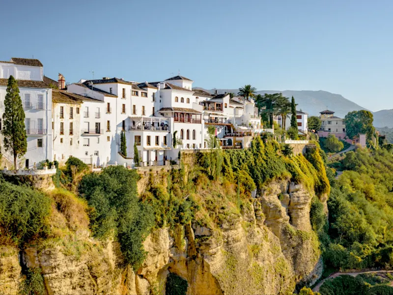 White houses on a steep cliff with great views. Ronda, Andalusia, Spain