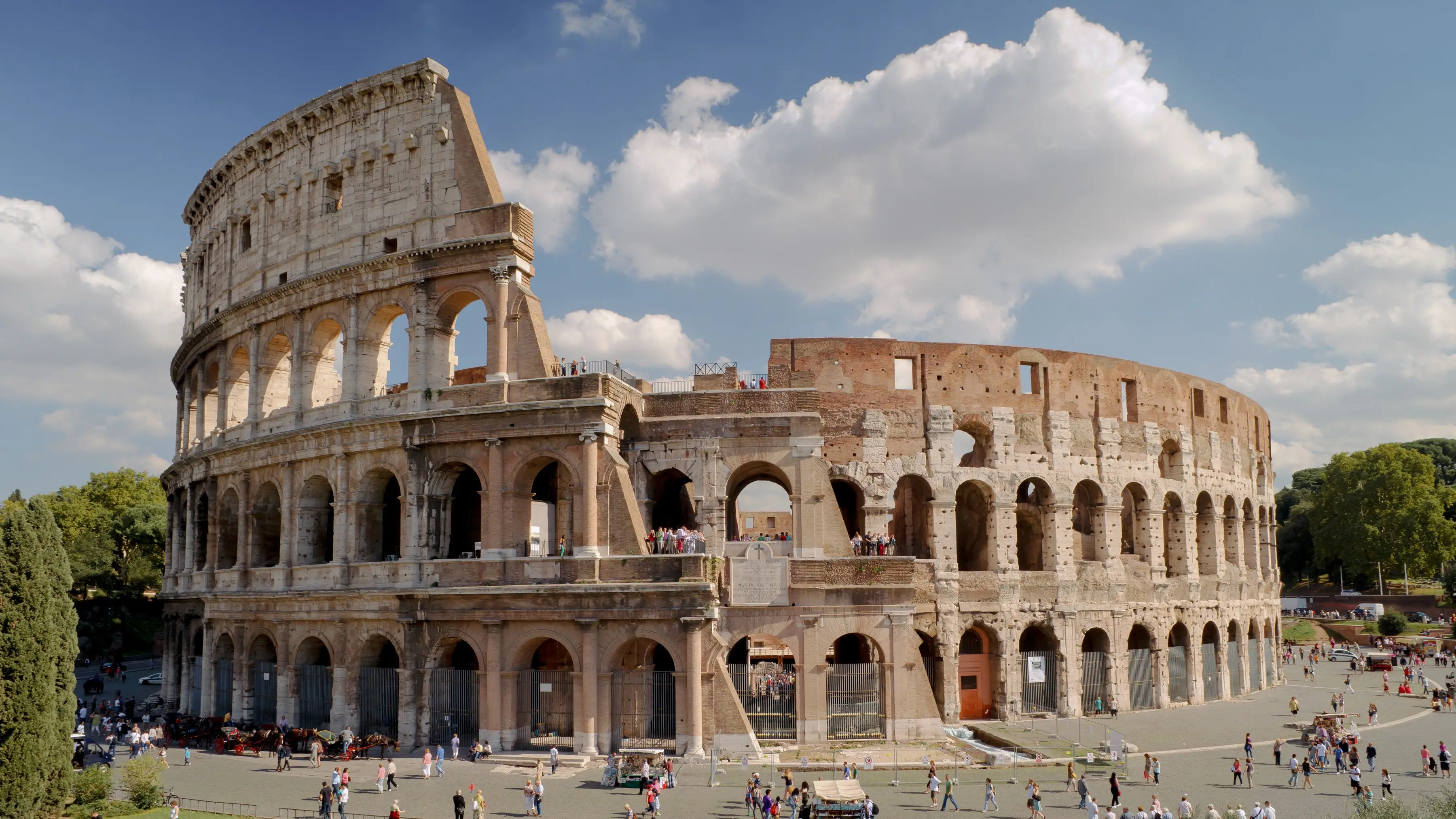 Colosseum in Rome and morning sun, Italy