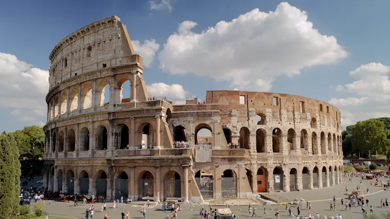 Colosseum in Rome and morning sun, Italy