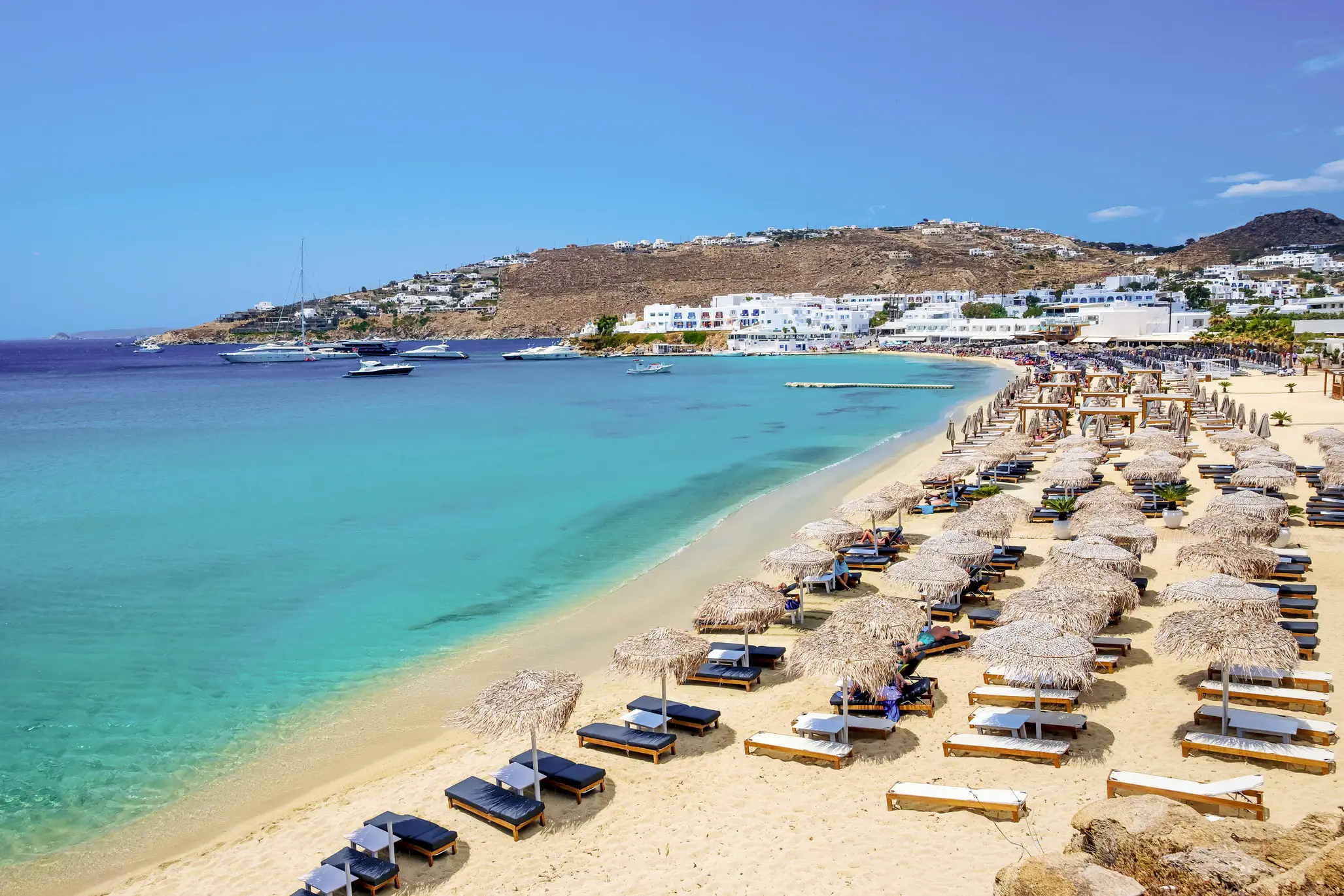 Pebble beach with turquoise water in Gialos, Lefkada, Greece.

