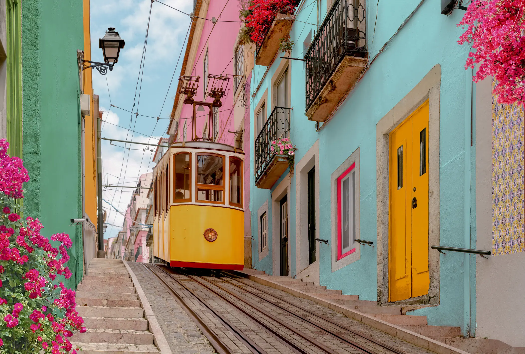 Typical yellow streetcar in Lisbon, Portugal.