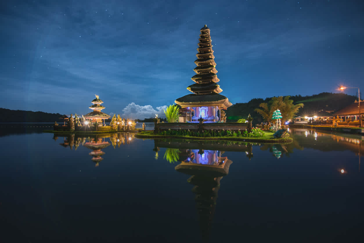 Discover the enchanting temples of Bali, pictured here at night, on a Bali vacation