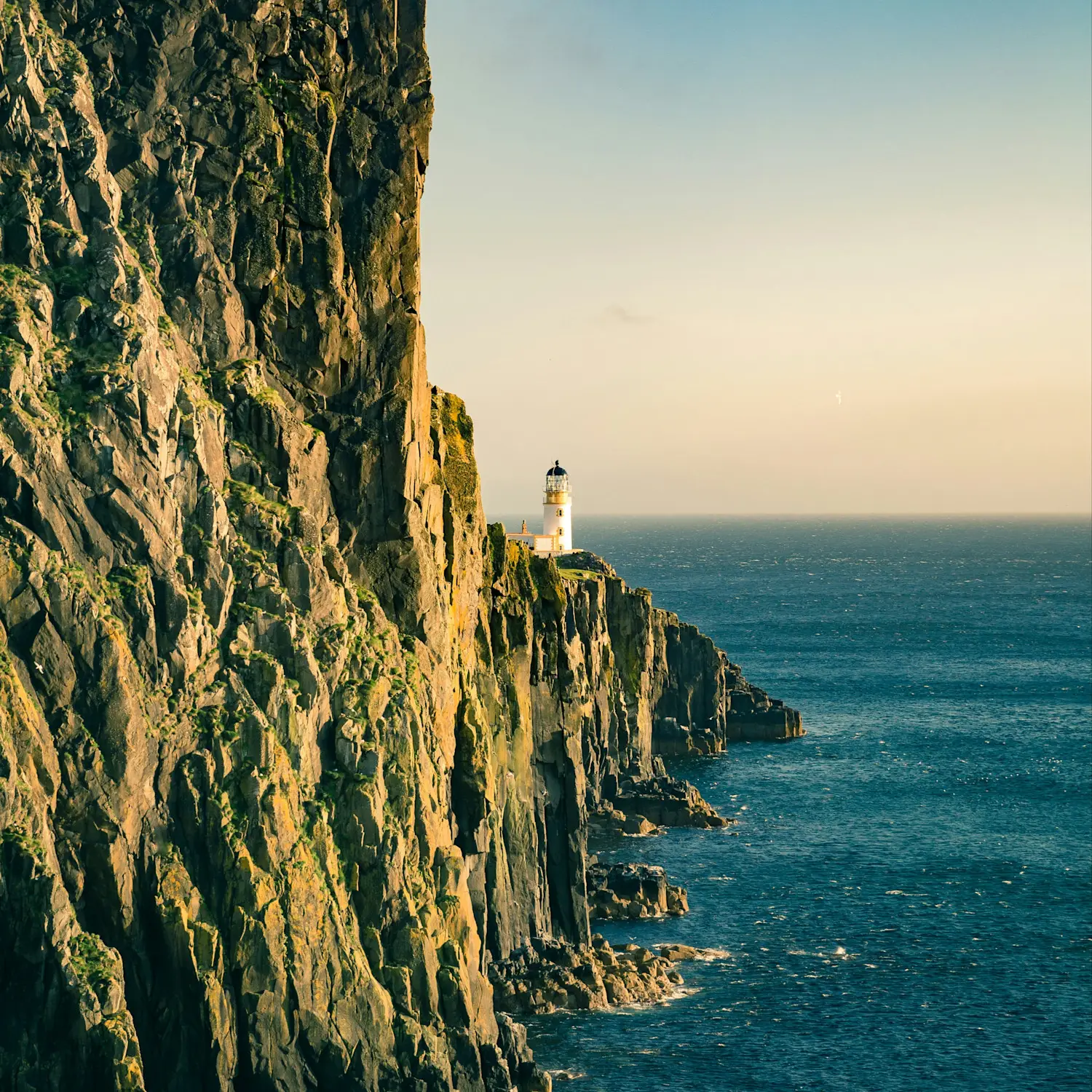 Old lighthouse in Turnberry, Ailsa Craig and Arran Isle, Scotland.