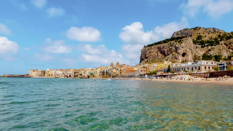 A picturesque view of the coast of Cefalù, Sicily, Italy.