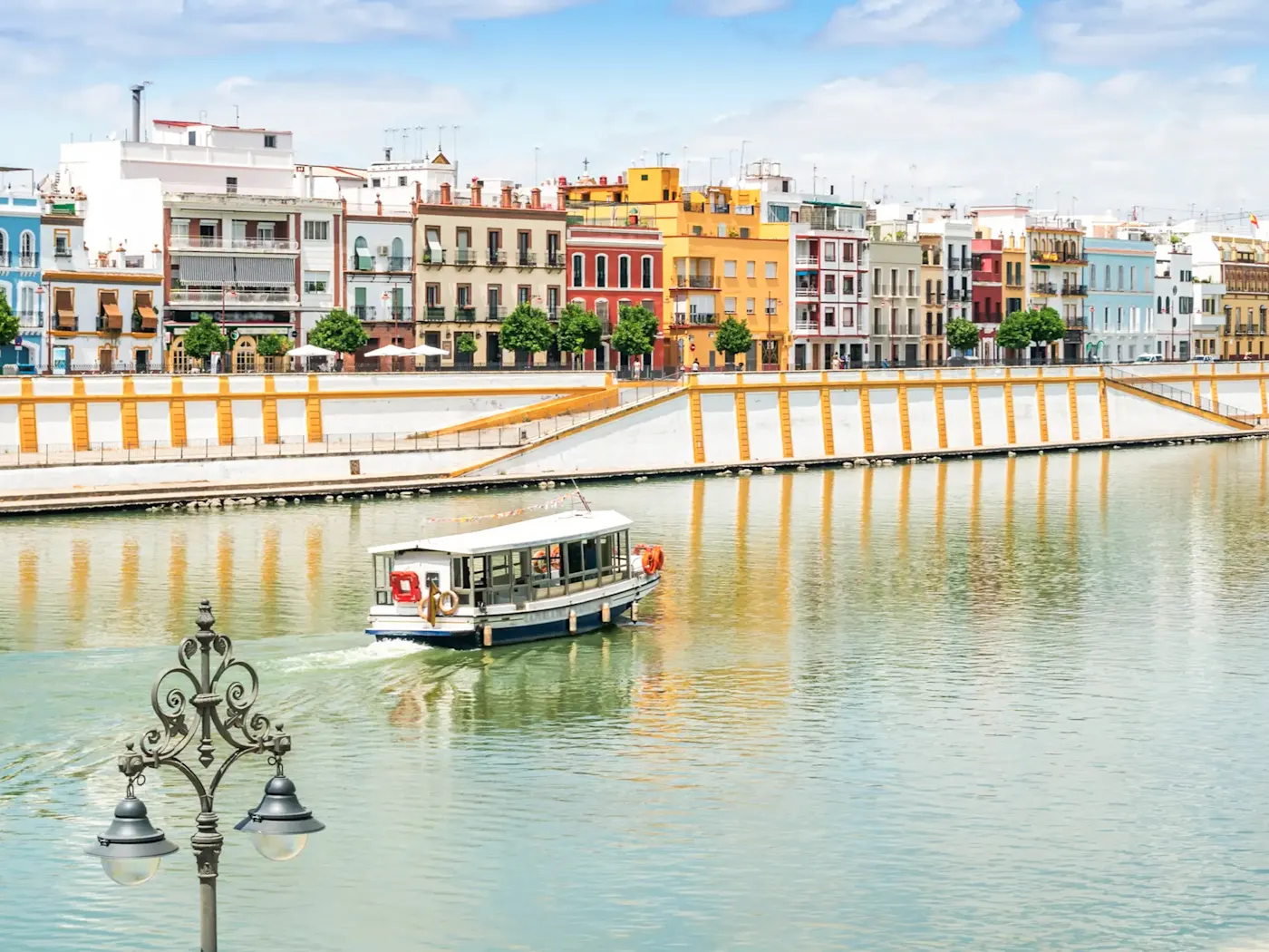 A peaceful boat trip along the Guadalquivir, Seville, Andalusia, Spain.