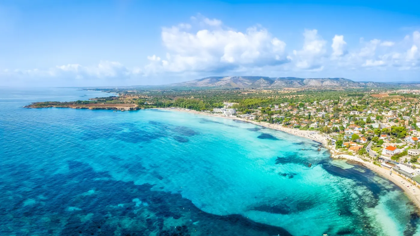 Aerial view of Syracuse with Fontane Bianche beach, Sicily, Italy with a view of the reef.

