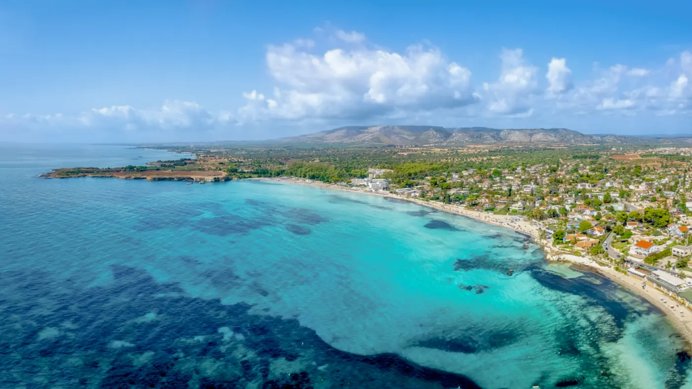 Aerial view of Syracuse with Fontane Bianche beach, Sicily, Italy with a view of the reef.
