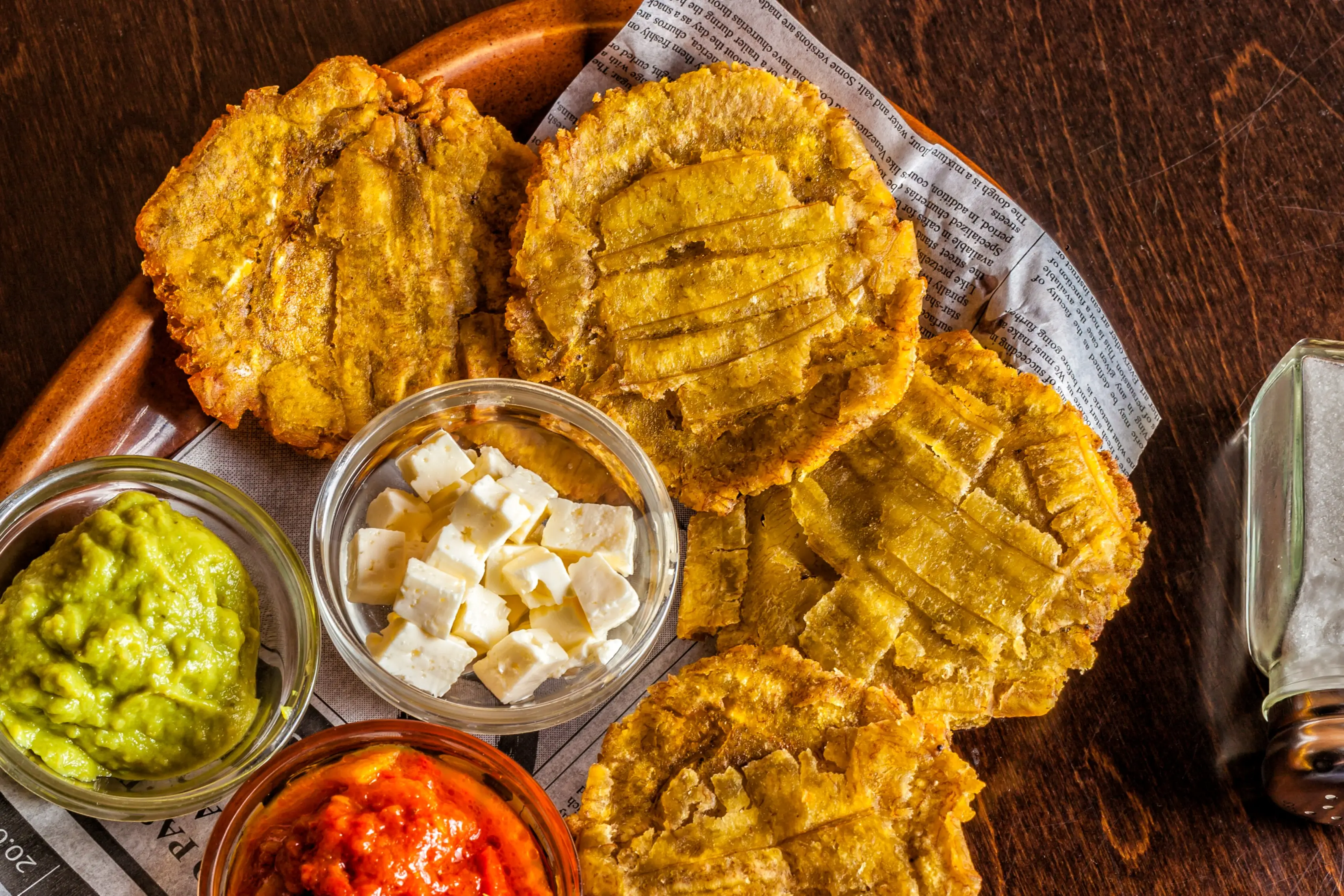 Costa-Ricanisches Essen, Patacones Patacones oder Tostones - gebratene grüne Wegerichscheiben