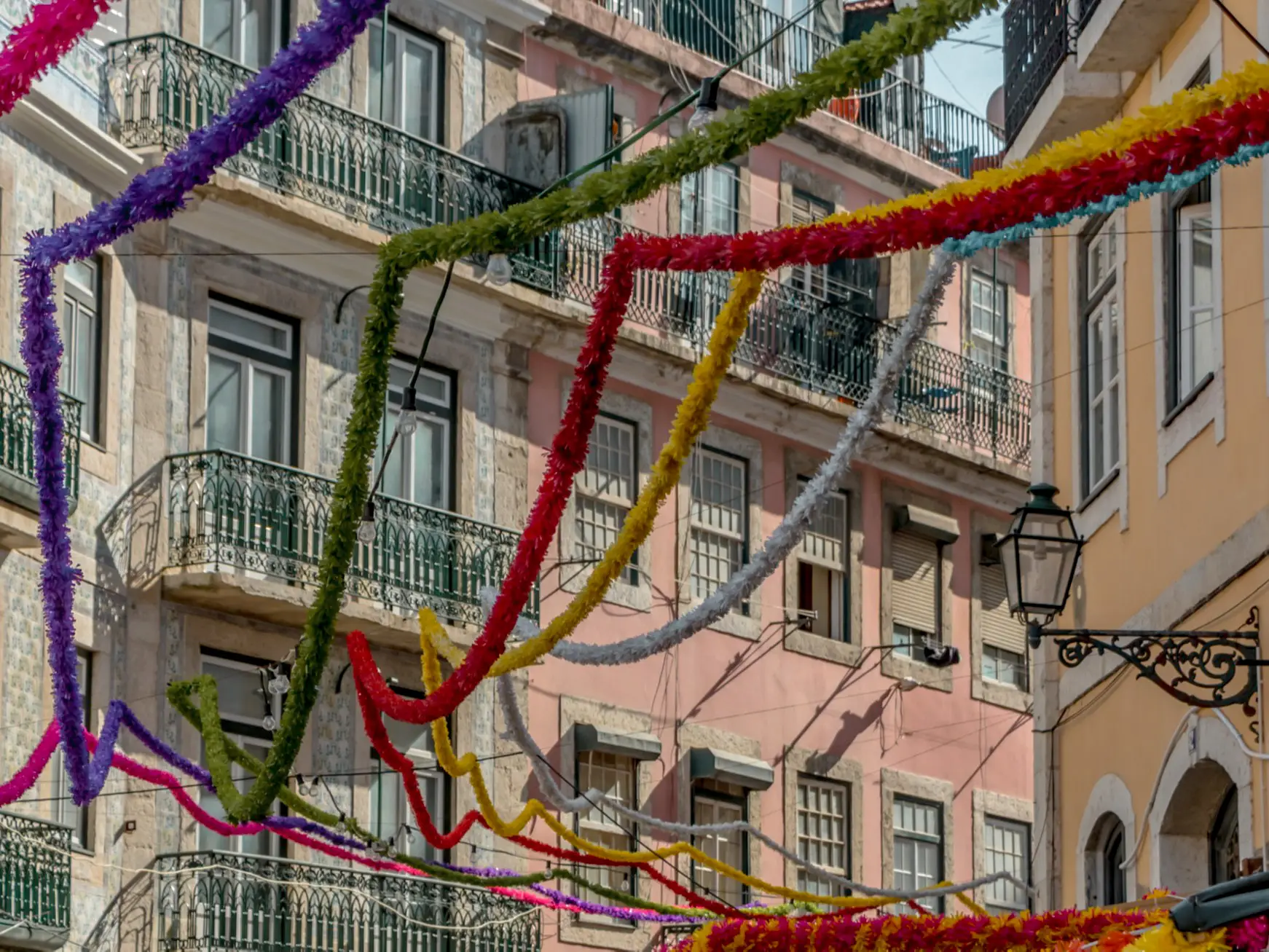 A picture of the Alfama neighborhood at the celebration of the Santos Populares of the city, Lisbon, Portugal.


