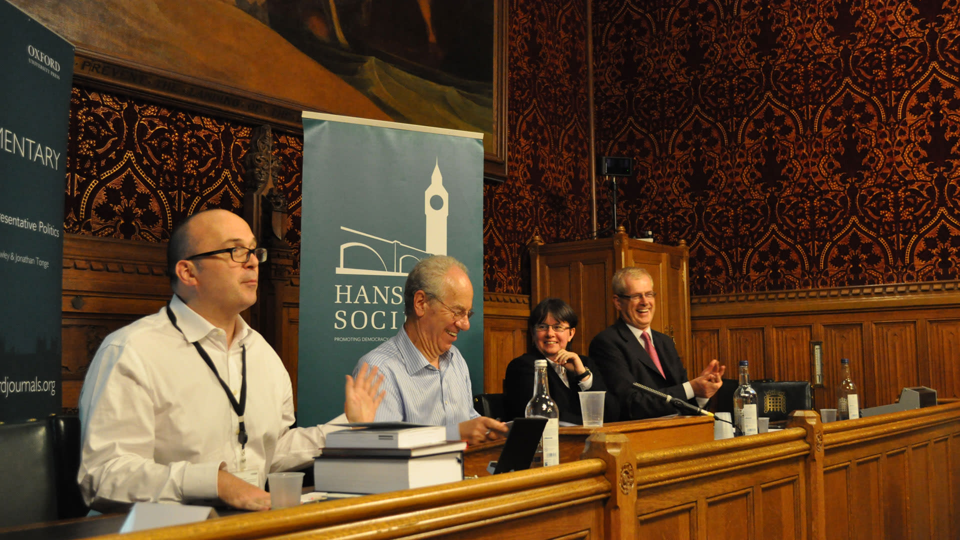 Panelists laughing during the 2014 Parliamentary Affairs annual lecture with Peter Kellner, Houses of Parliament, Westminster