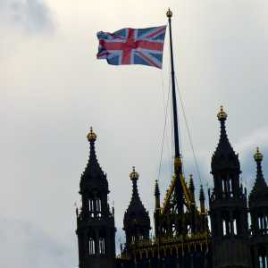 The Union Jack flying atop the Victoria Tower of the UK Houses of Parliament.