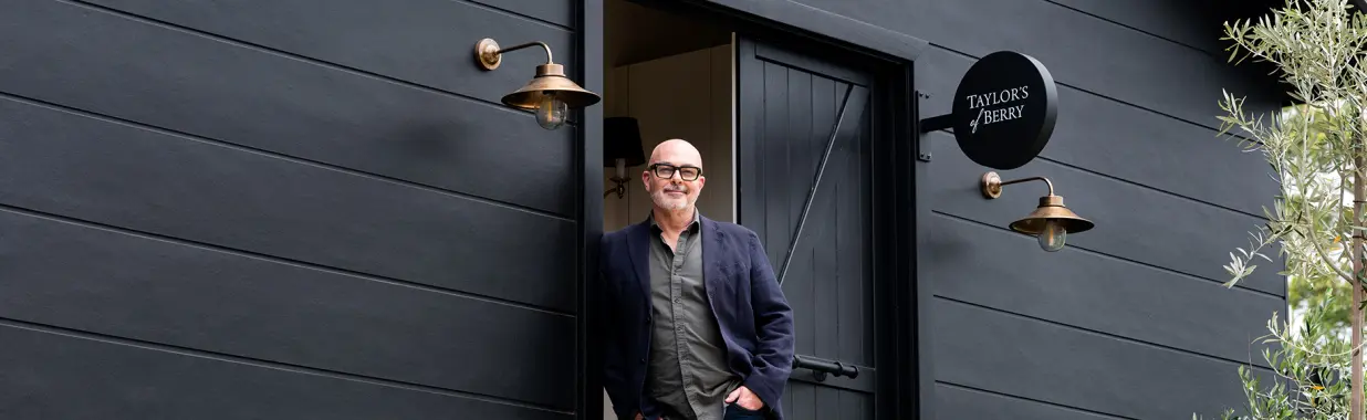 Neale Whitaker brings drama and luxury to the country with a black façade 