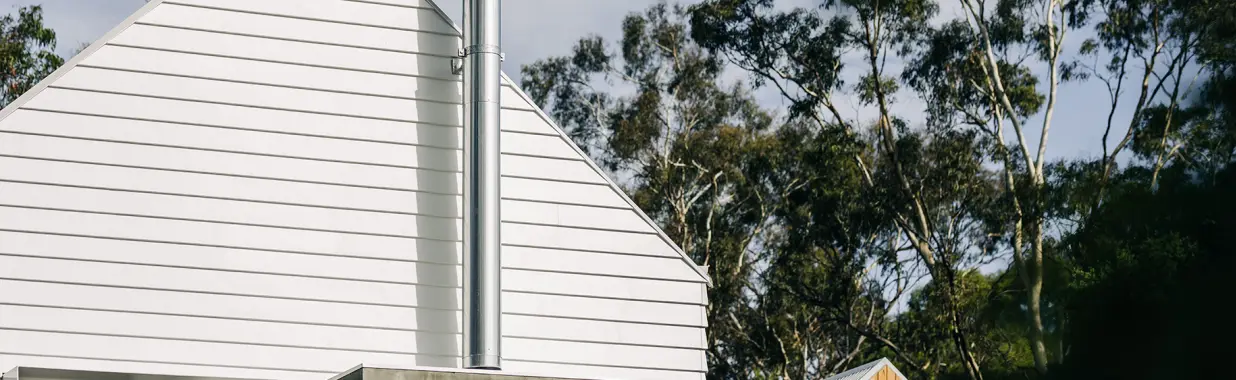 Gable-end pavilions wrapped in the crisp lines of Linea™ Weatherboard