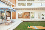 Kyal and Kara Blue Lagoon verandah. Modern coastal styling and crisp white Linea weatherboards.