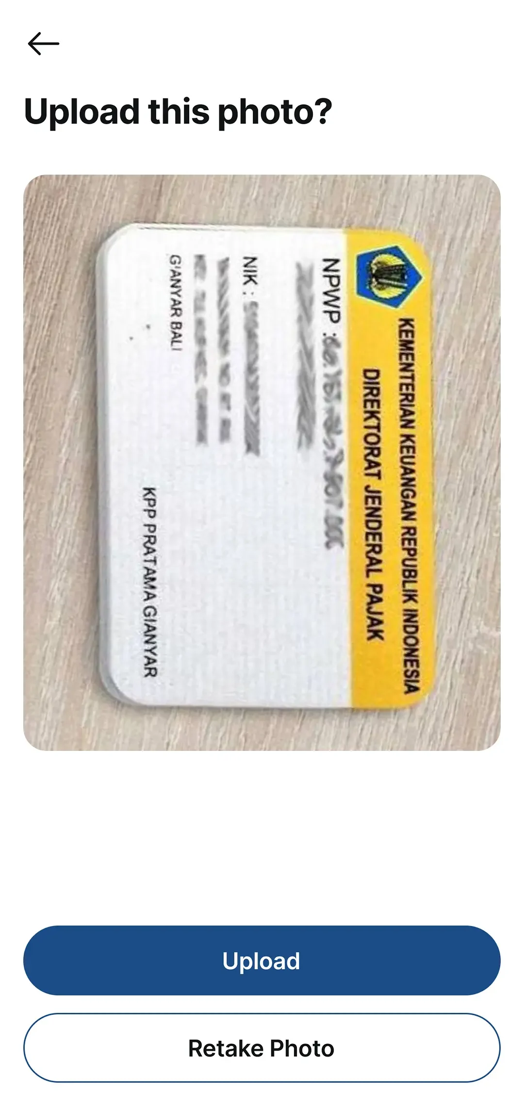 Preview of the captured NPWP card with upload and retake options.