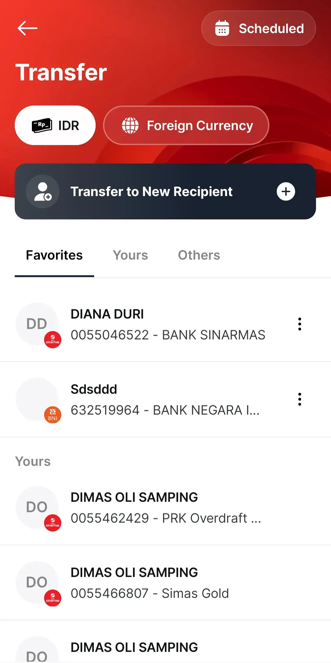 Transfer screen with favourite and saved recipients and a foreign currency option.