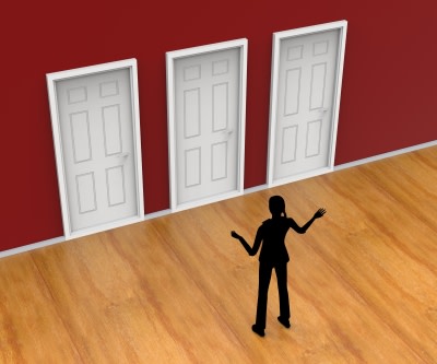 Figure standing in front of three doors