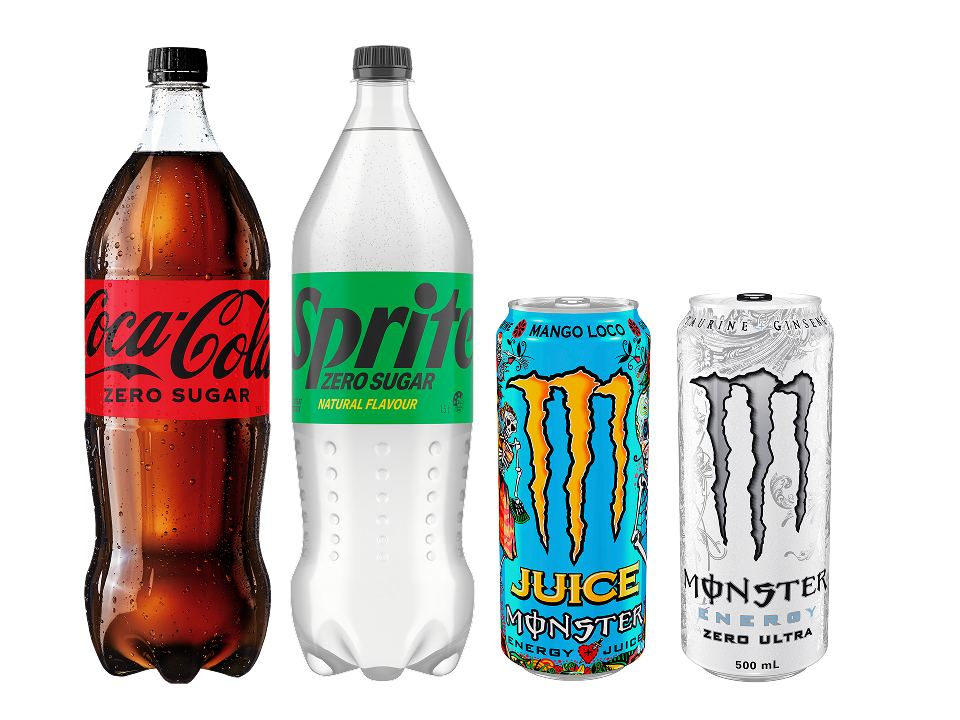 Bottles of Coca-Cola Zero Sugar and Sprite Zero Sugar standing next to cans of Monster Mango Loco and Monster Zero Ultra energy drinks.