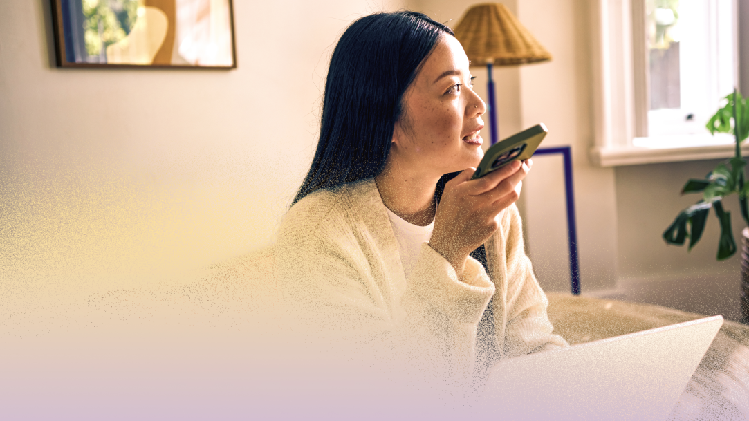 A woman speaking into her phone