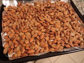 Candied almonds ready to go into the oven, coated in the sugar egg mixture