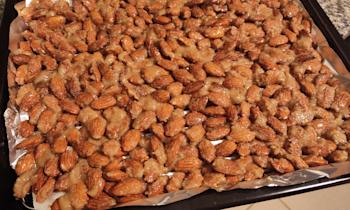 Candied almonds ready to go into the oven, coated in the sugar egg mixture