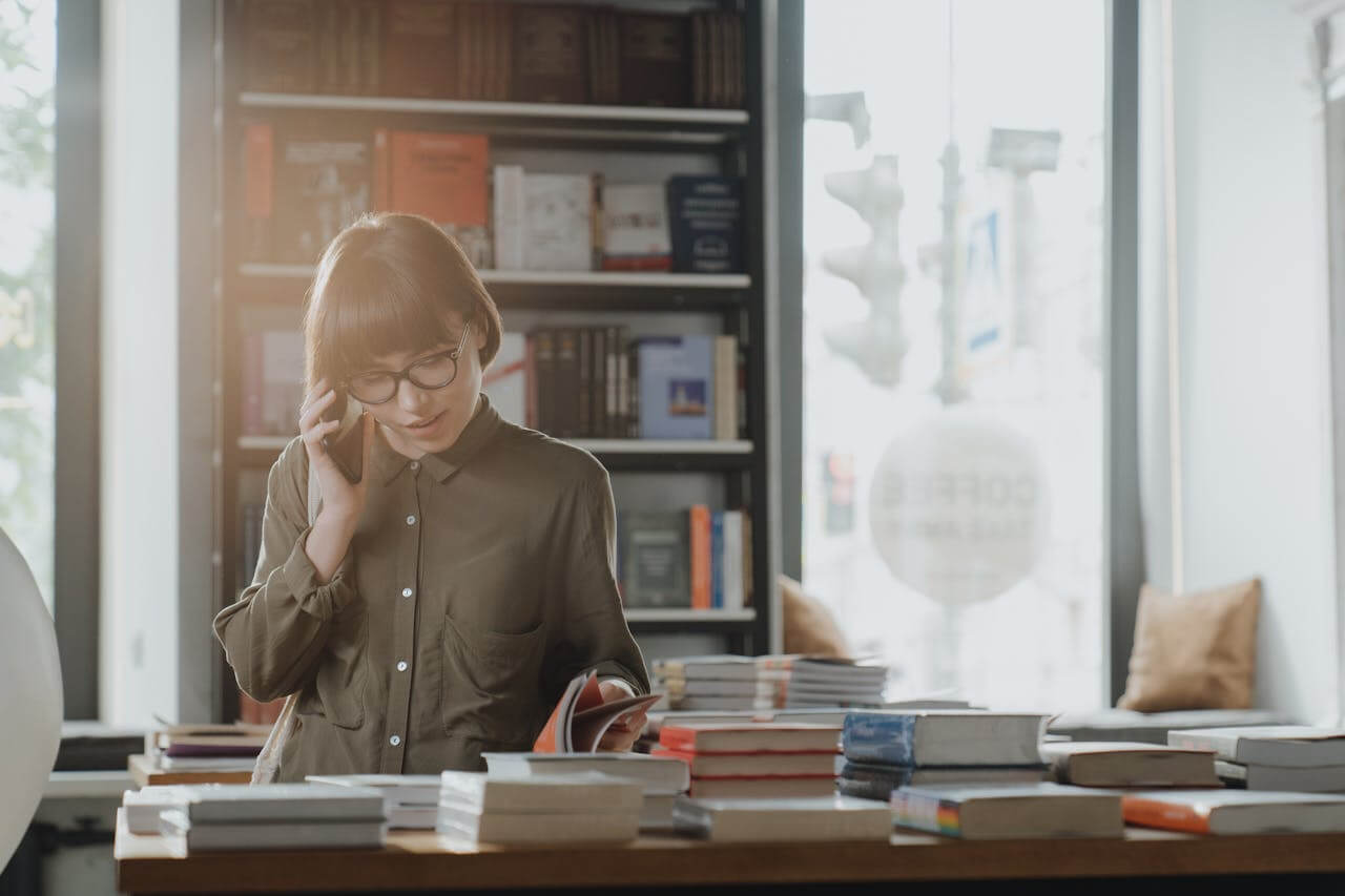 young-woman-browsing-books-as-a-form-of-self-care
