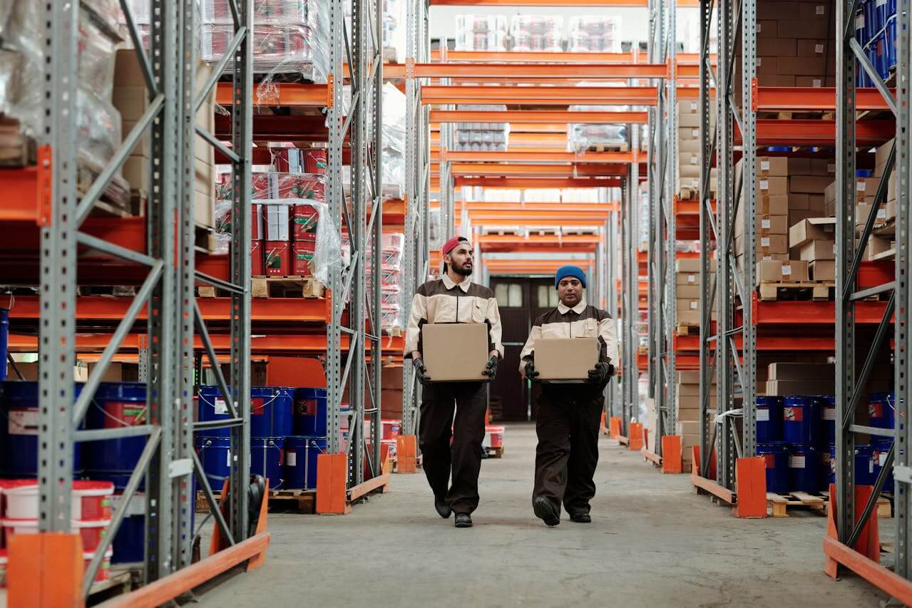 workers-carrying-parcles-in-a-warehouse