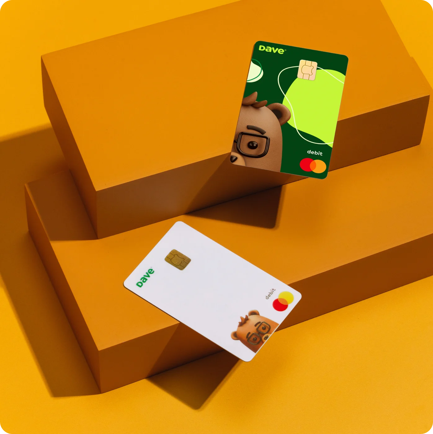 Dave debit cards on an orange background
