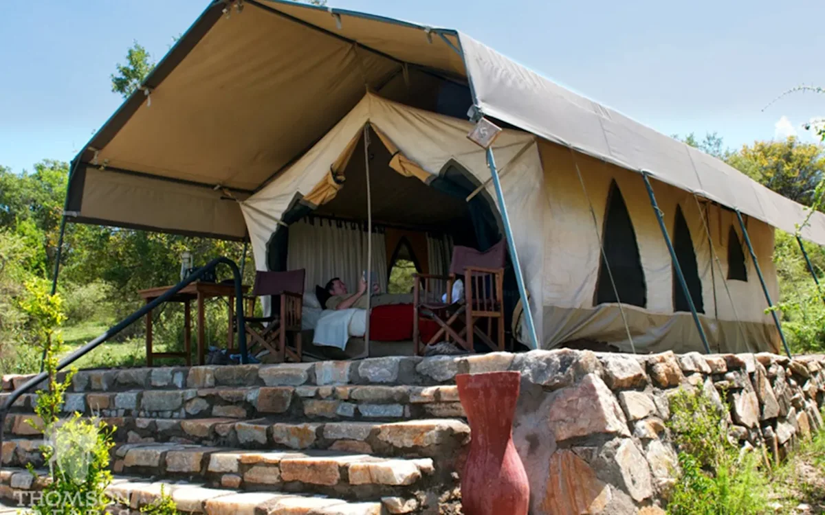 Guest tent on a raised stone platform at Eastern Serengeti Nyumba