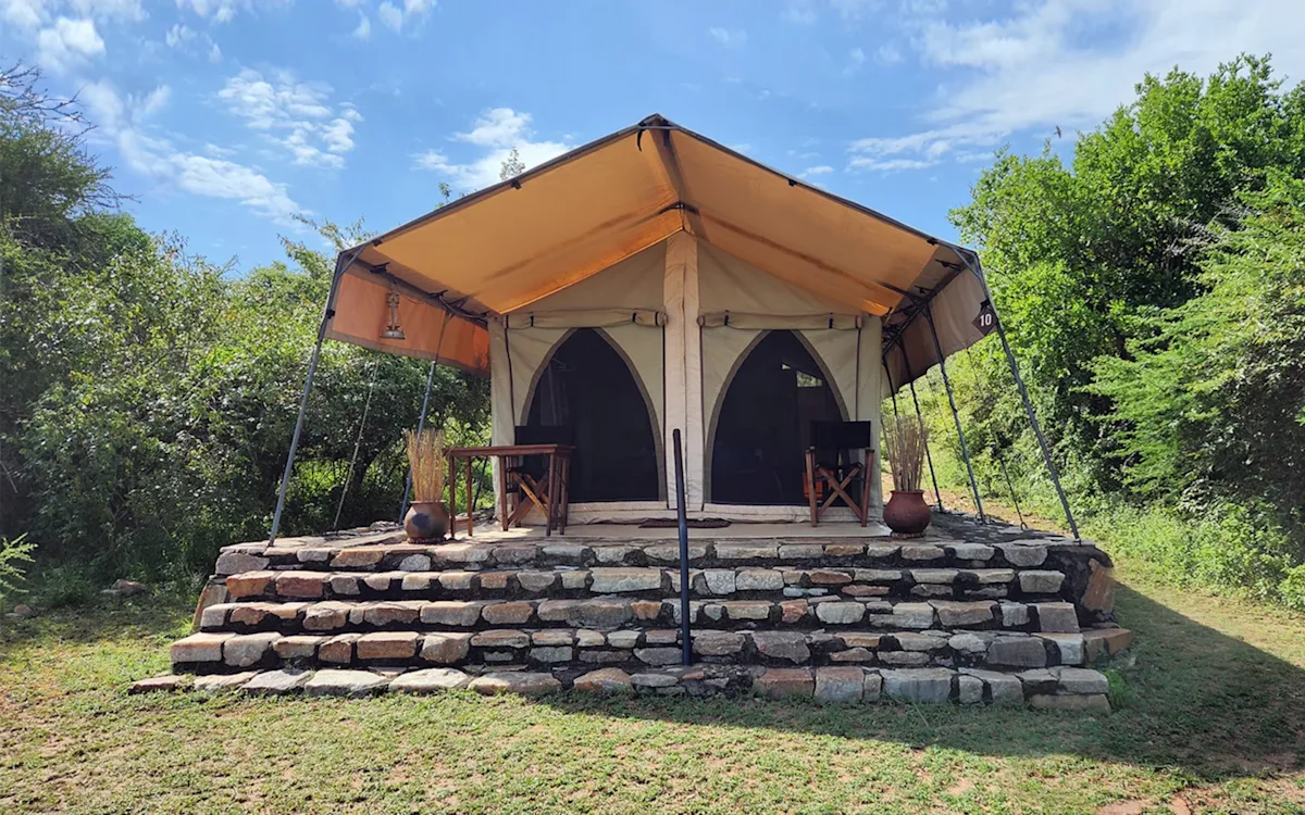 Canvas guest tent atop stone steps at Eastern Serengeti Nyumba