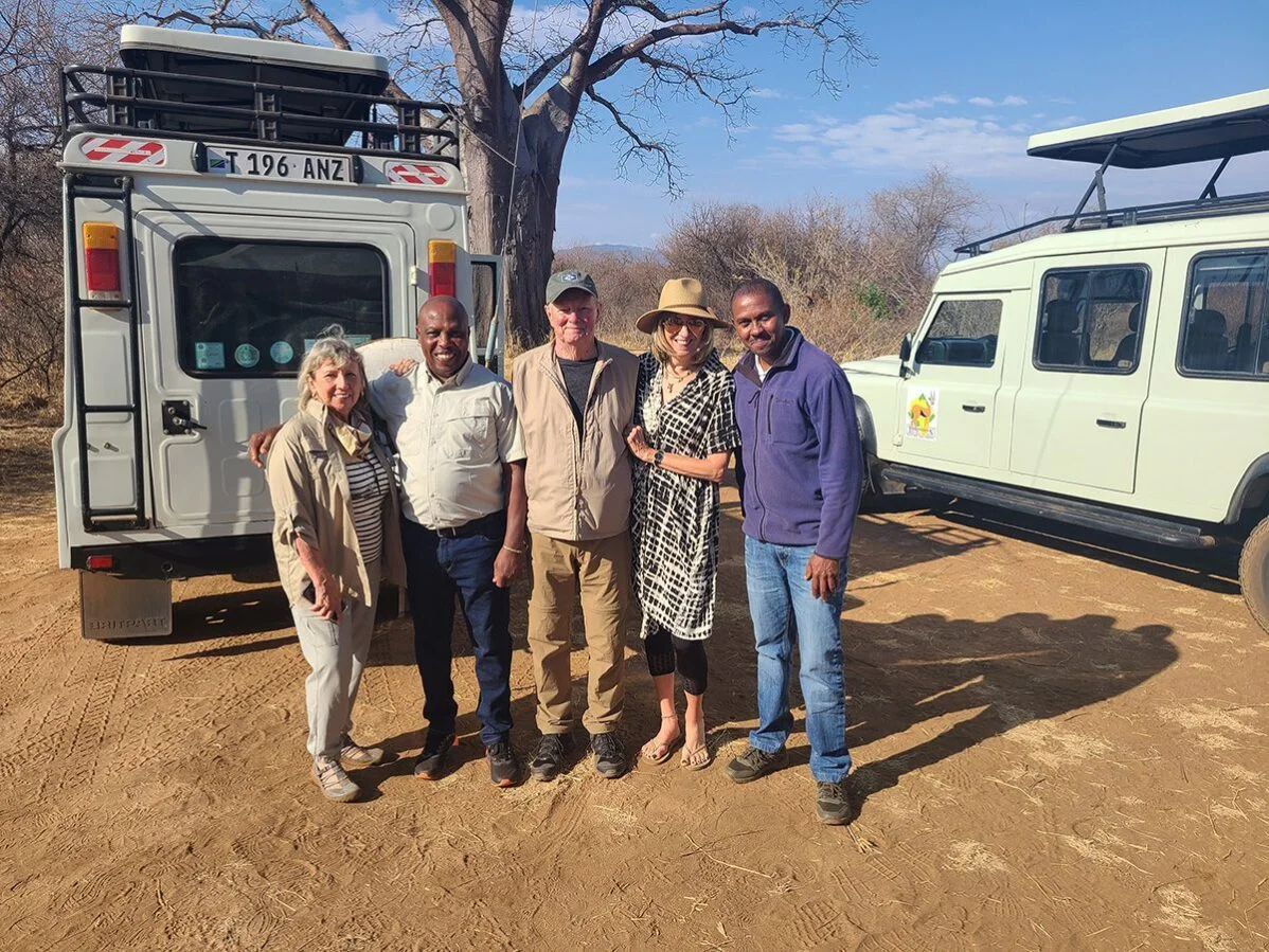 thomson guides harrison and james with guests in tanzania