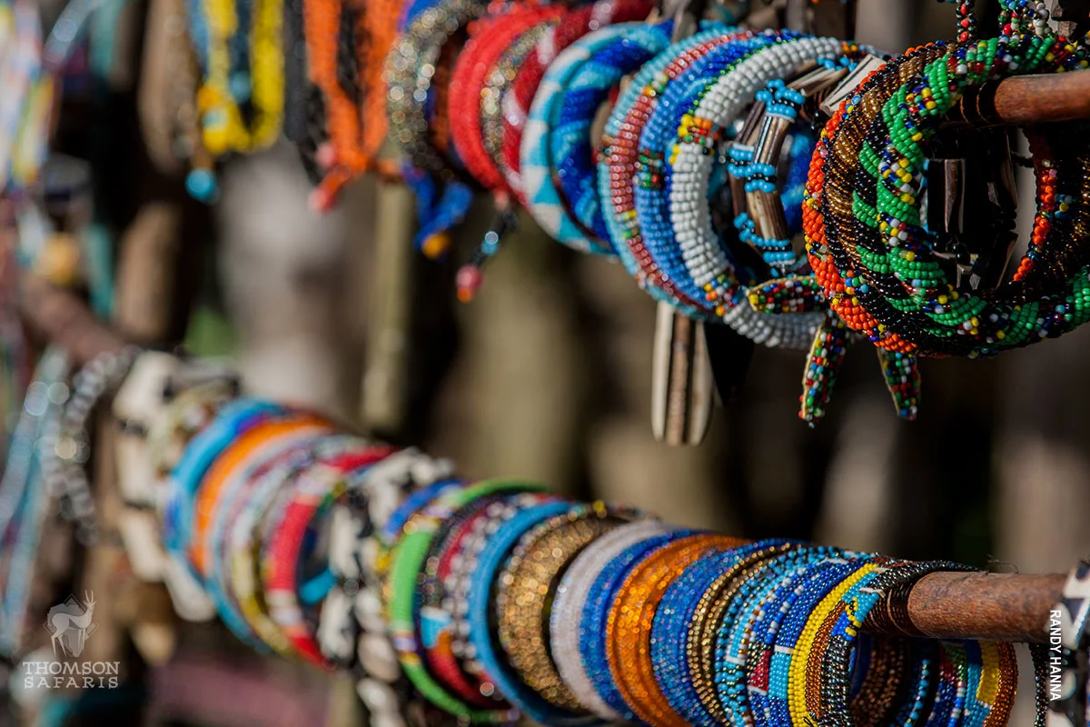 Rows of colorful Maasai beaded bracelets on display