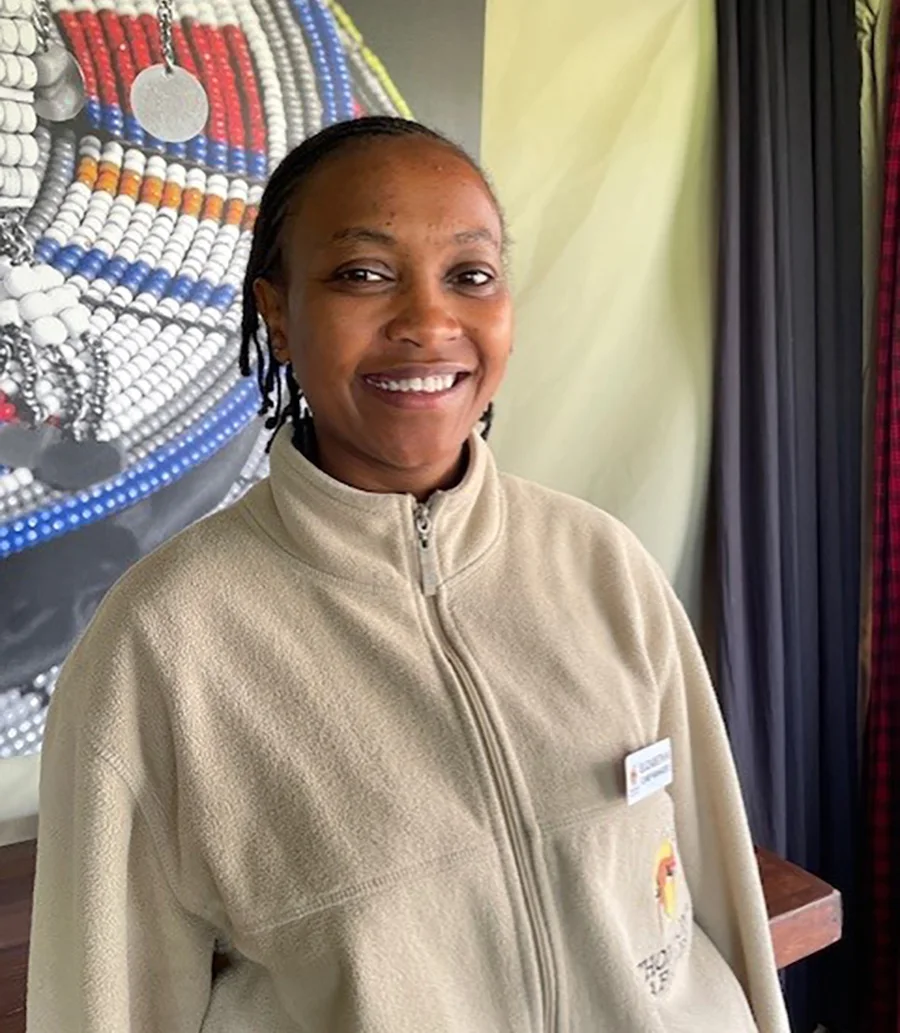 Portrait of Elizabeth J. Nangay smiling in a Thomson Safaris fleece