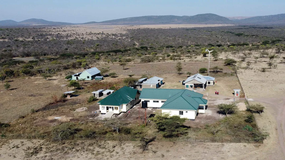 Aerial view of the Sukenya health center buildings on open, dry plains