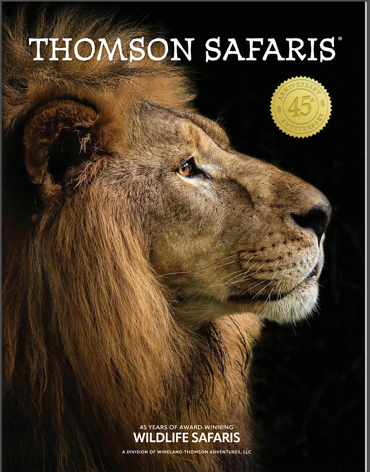Thomson Safaris catalog cover: a male lion in profile against a black background.