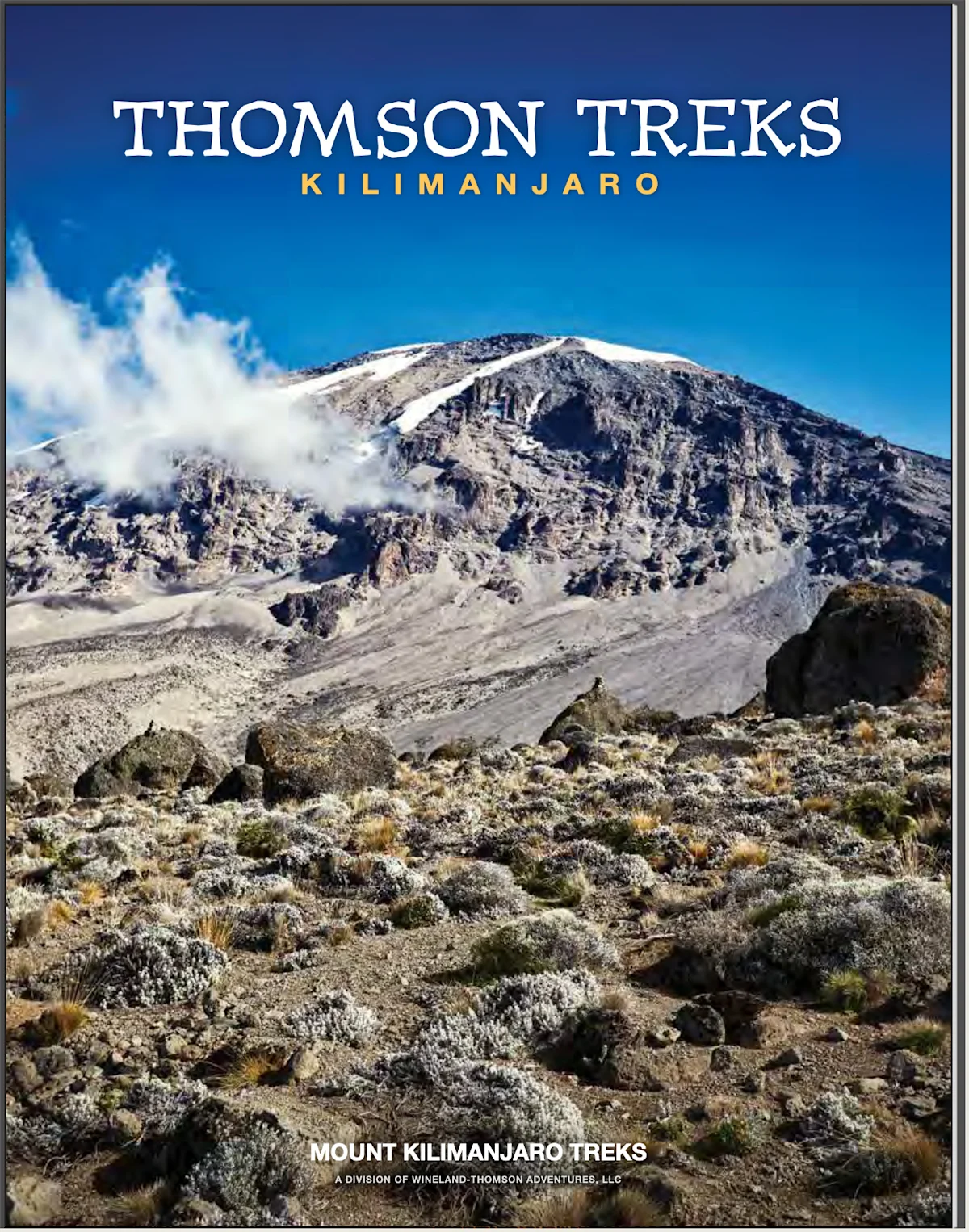 Cover of the Thomson Treks catalog showing the rocky slopes and summit of Mount Kilimanjaro