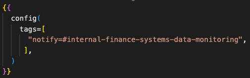 A screenshot of a code sample showing the model config to notify an internal Slack channel.